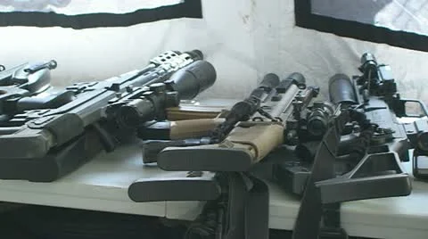 Guns in the tent 스톡 동영상 10833380