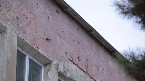 Gunshot wounds on the wall 2 Stock Footage 323027645