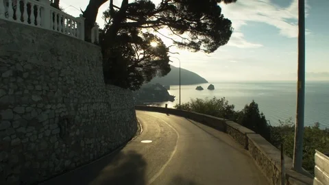 Gurzuf, pull shot low over the road, leaving the mountain. Shot 2. 스톡 동영상 83183411