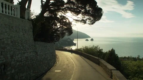Gurzuf, pull shot, low over the road, leaving the mountain. Shot 1 스톡 동영상 83183472