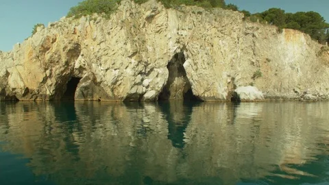 Gurzuf, pull shot over the water.  Rock Chaliapin, Pushkin grotto. Shot 1 스톡 동영상 83183310