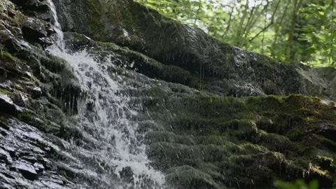 A gushing stream. Creative.Big stones in the mountains on which a cold spring 스톡 동영상 202041784