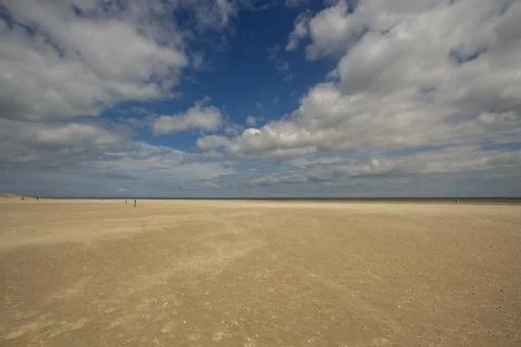 A gust of wind blowing over the beach Stock Photos