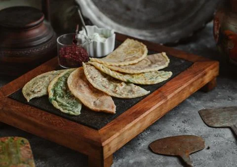 Gutab stuffed flatbreads board served with sumac and yoghurt Stock Photos
