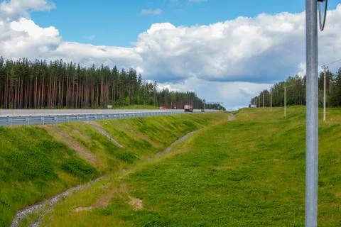 Gutter-drainage system of ditches of road transport infrastructure Stock Photos