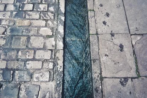 Gutter on the Edge of the Pavement Fotos de archivo