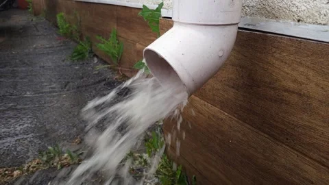 Gutter overflowing with rainwater. Stock Footage 279560329