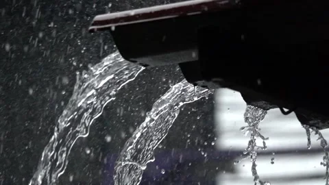 A gutter is overflowing with water Stock Footage 291283940