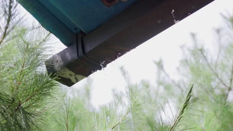 Gutter Series 02 - Close Up Water Leaking From Gutter Stock Footage 343245450