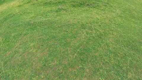 The guy accelerates and jumps down a high hill near the river Bank. Extreme. Stock Footage 108370896