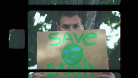 A guy-activist at a demonstration for climate protection Stock Footage 147842547