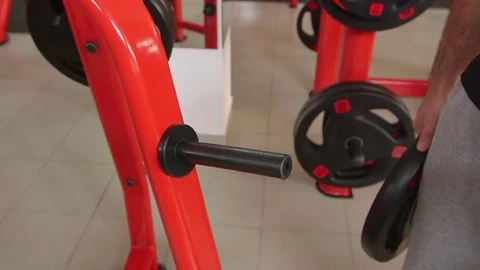 The guy adds the load to the simulator Stock Footage 73989068