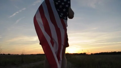 The guy with the American flag Stock Footage 77086061