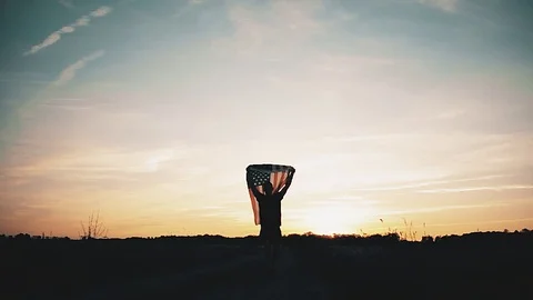 The guy with the American flag Stock Footage 77086112