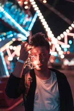 Guy in the amusement park Stock Photos
