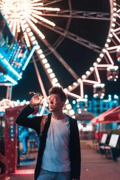 Guy in the amusement park Stock Photos