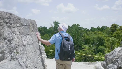 Guy On Ancient Mayan Ruin Temple In Jungle Stabilized Footage 4K Stock Footage 94471397