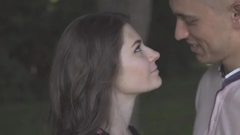 The guy and the girl look each other in the eyes Stock Footage