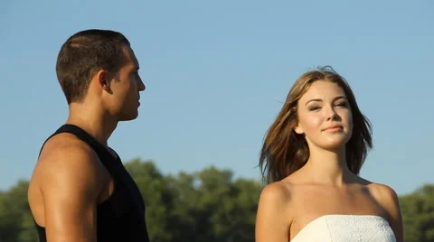 Guy and girl on the river Stock Footage 66752183