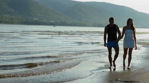 Guy and girl on the river Stock Footage 66752471