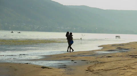 Guy and girl on the river Stock Footage 66752683