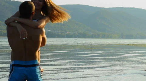 Guy and girl on the river Stock Footage 66752789