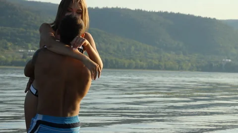 Guy and girl on the river Stock Footage 66752841