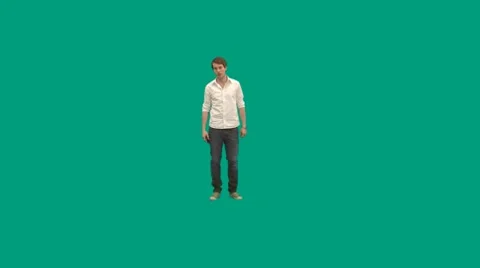 Guy answers mobile phone while walking - green screen - pre keyed - MINT.GS Stock-Footage 8621469