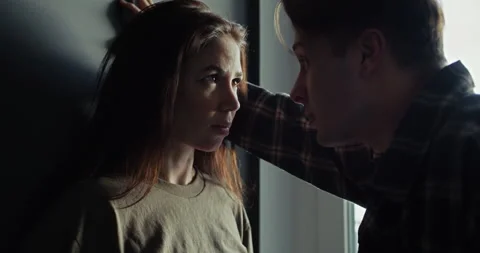 The guy approached his girlfriend, looks into your eyes and expresses his Stock Footage 305775650