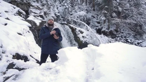 Guy are shooting the mountains. slow motion Stock Footage 83401235