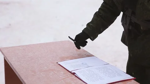 The guy in the army. Army in the winter. A soldier with a weapon. Stock Footage 130727573