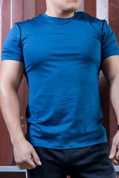 The guy is an athlete without a face in a blue T-shirt Stock Photos