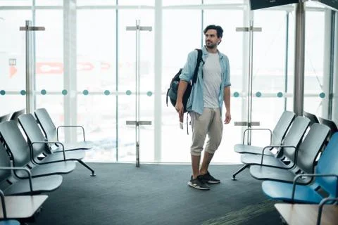 The guy with the backpack at the airport 写真素材