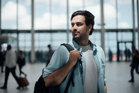 The guy with the backpack at the airport 写真素材
