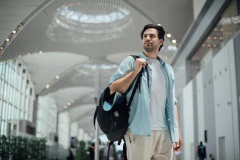 The guy with the backpack at the airport 写真素材