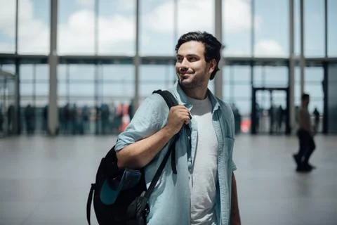 The guy with the backpack at the airport Stock Photos
