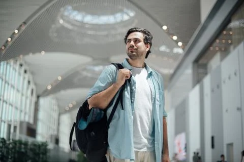 The guy with the backpack at the airport Stock Photos