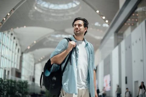 The guy with the backpack at the airport Stock Photos