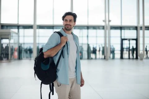 The guy with the backpack at the airport Stock Photos