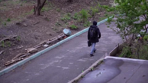 A guy with a backpack Stock Footage 153835610