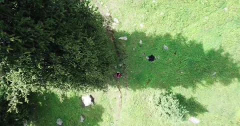 A guy with a backpack is walking in the mountains Video stock 139963393