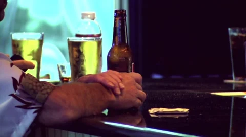 Guy at Bar Drinking Beer Stock Footage 888883