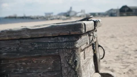 The Guy On The Beach Is Trying To Open The Chest Stock Footage 135075525