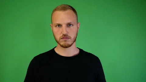 Guy with a beard angry background chromakey Stock Footage 115237551