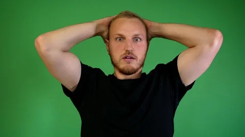 Guy with a beard was shocked Stock Footage 115238493