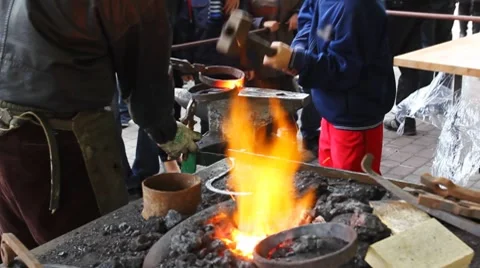 Guy Beats Hammer Two Rings Stock Footage 8659552