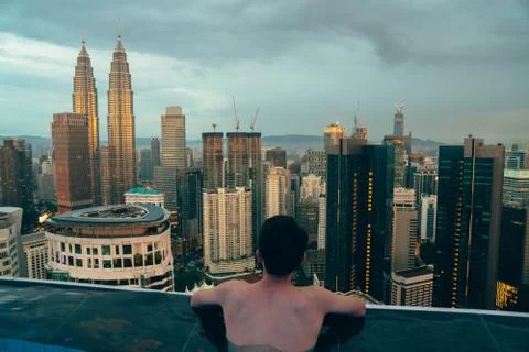 Guy from behind in a pool Stock Photos