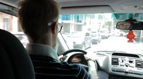 The guy behind the wheel of a car Stock Footage 23564300