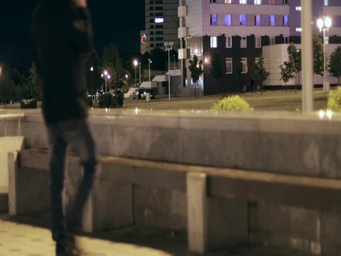 Guy on a bench in the park. Stock Footage 77336717