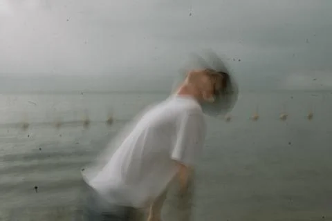 Guy bending over looking at the sky asks for forgiveness Stock Photos